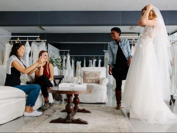 bride and bridesmaid wedding dress shopping