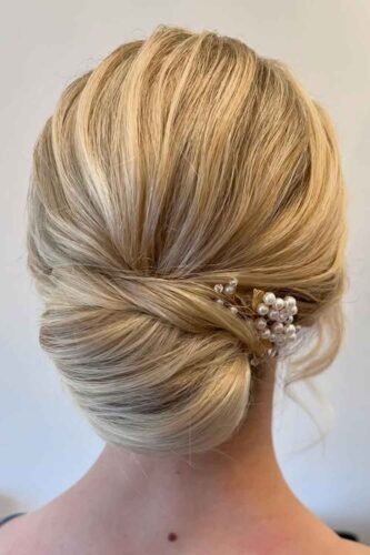 Simple low bun from @sophistic_hair