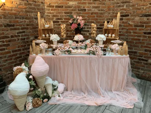 Image of Ice Cream themed dessert table for a She's Been Scooped Up Bridal Shower