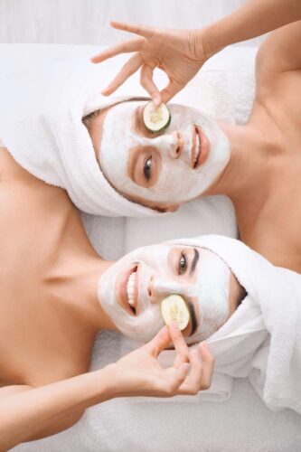Young Women with Facial Masks and Cucumber Slices in a Bridal Shower