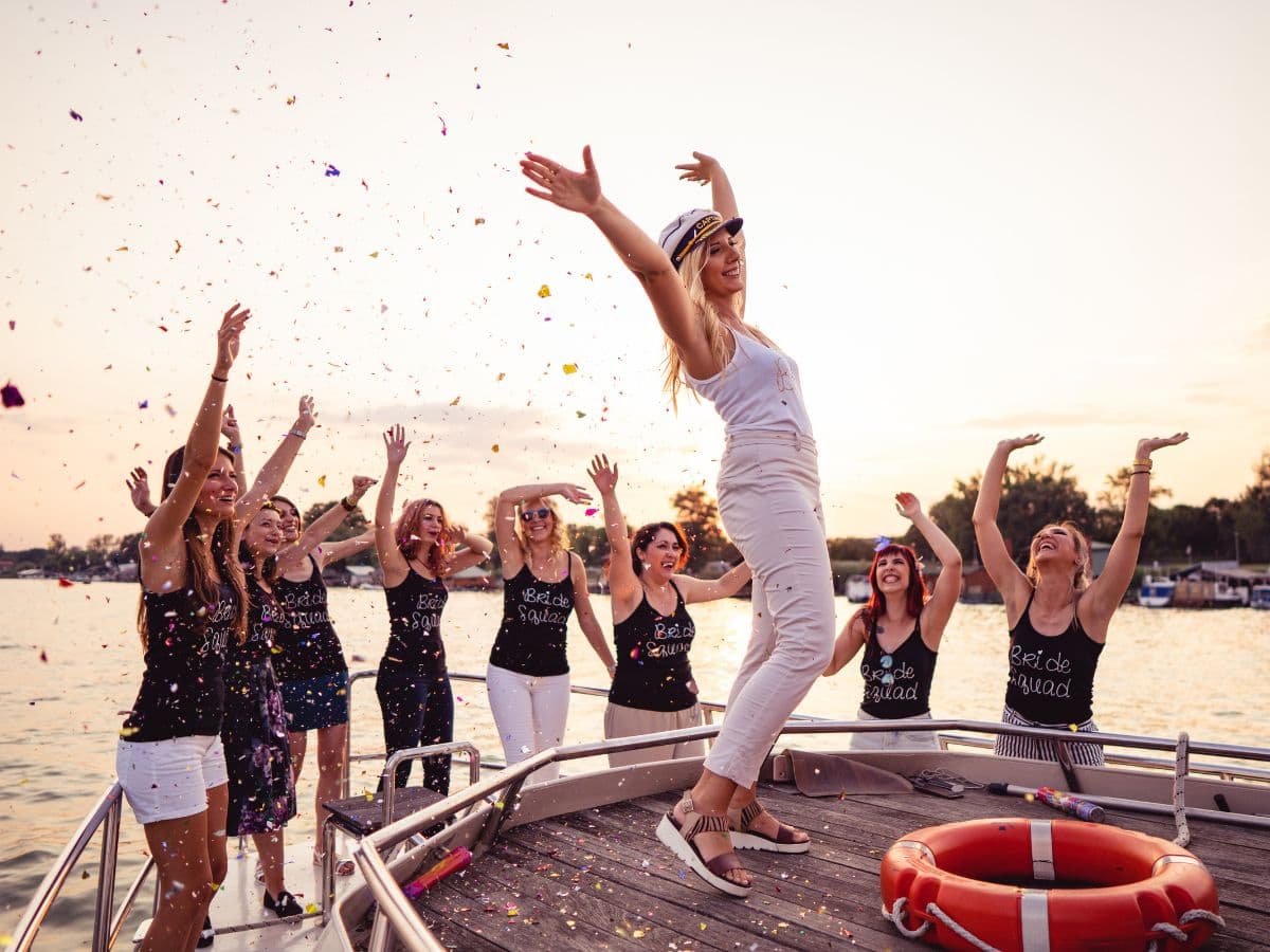 Large Bachelorette Party featured image showing bride to be with a big group of guests on a boat