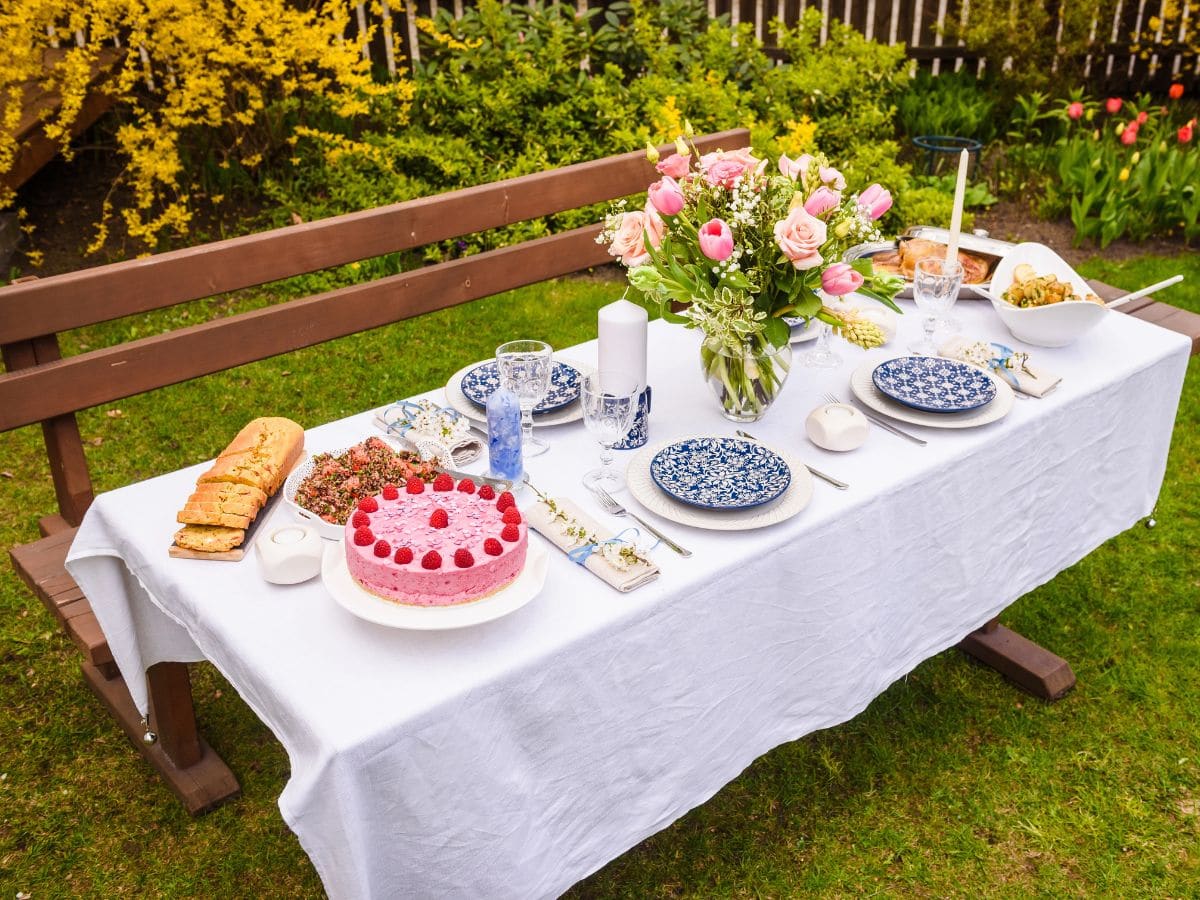 Bridal Shower on a Budget featured image showing a simple food table in the back garden